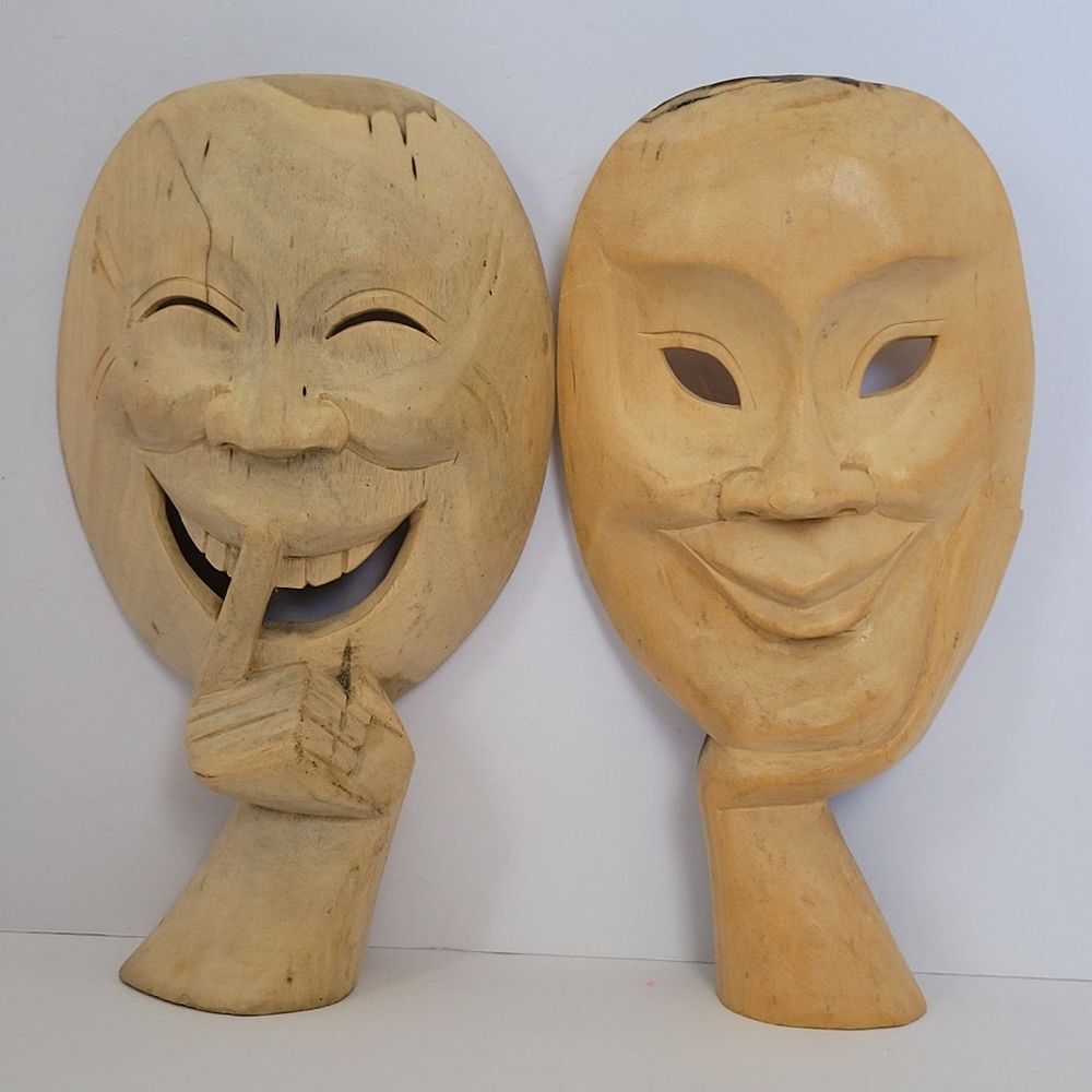 2 Hand-carved wooden theatrical or decorative mask